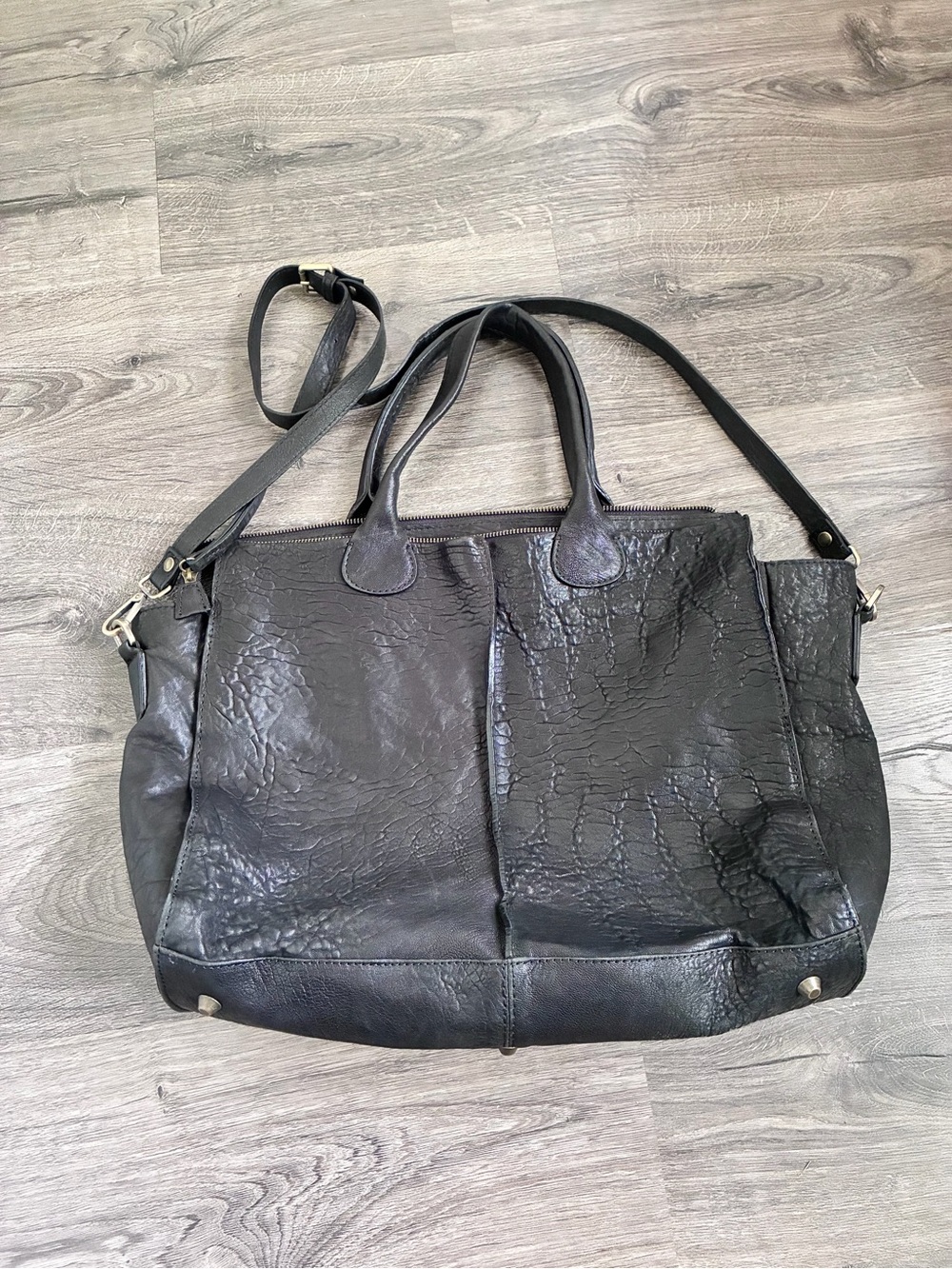 Textured Black Leather Tote with Dual Handles and Adjustable Shoulder Strap